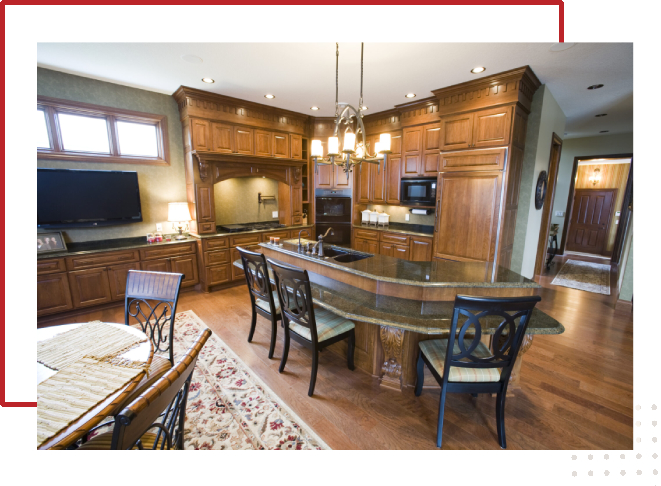 A kitchen with a dining table and chairs