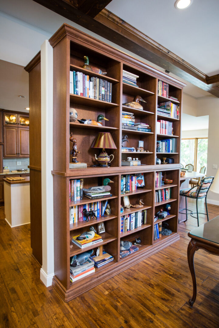 A bookshelf with many books on it